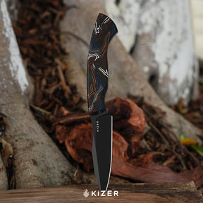 Kizer 1109A1 Hissbite in hand at camp