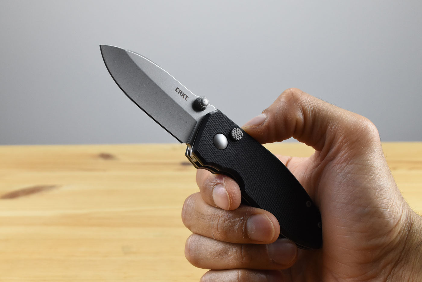 CRKT 2474 Squid Button Lock Folding Knife (Black G10 Handle)