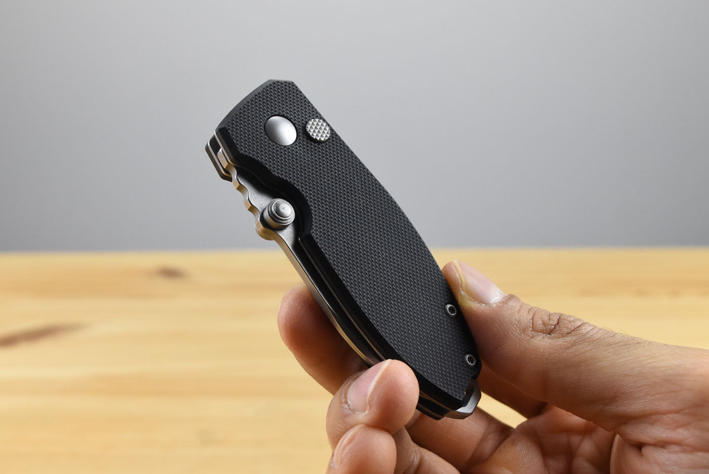 CRKT 2474 Squid Button Lock Folding Knife (Black G10 Handle)