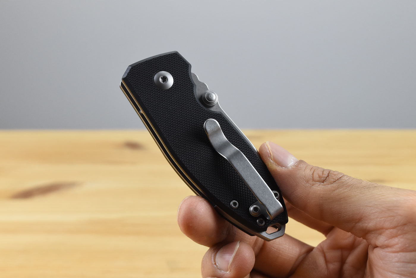 CRKT 2474 Squid Button Lock Folding Knife (Black G10 Handle)