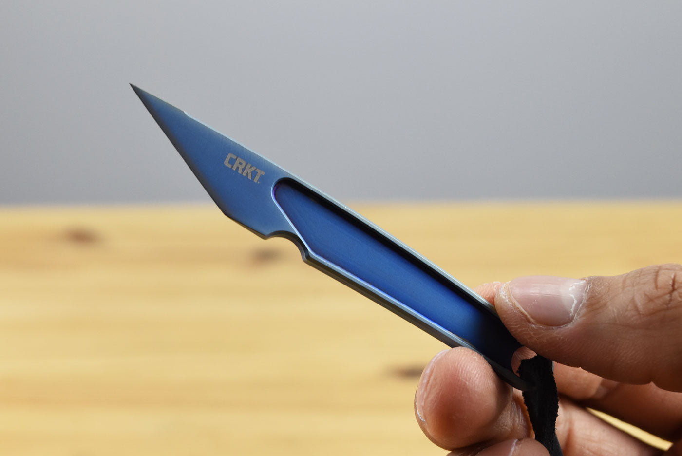 CRKT 7065 HangTi Fixed Blade (One Piece Blue Titanium Construction)
