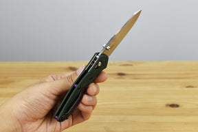 Benchmade 945 Mini Osborne Folding Knife (Green Aluminum Handle)