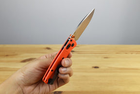 Benchmade 533 Mini Bugout Folding Knife (Orange Grivory Handle)