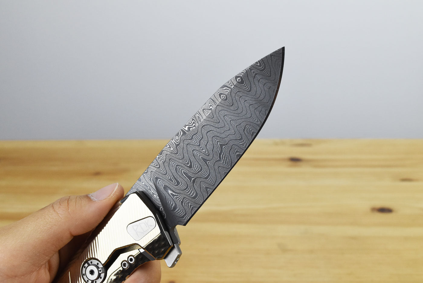 LionSteel ROK (Gold Titanium Handle)