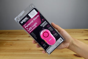 SABRE Personal Alarm With LED Safety Light (2-in-1 Clip-On / Pink)