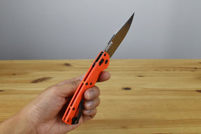 Benchmade 15535 Taggedout Folding Knife (Orange Grivory Handle)