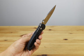 Benchmade 556-S30V Mini Griptilian Folding Knife (Black Noryl GTX Handle)